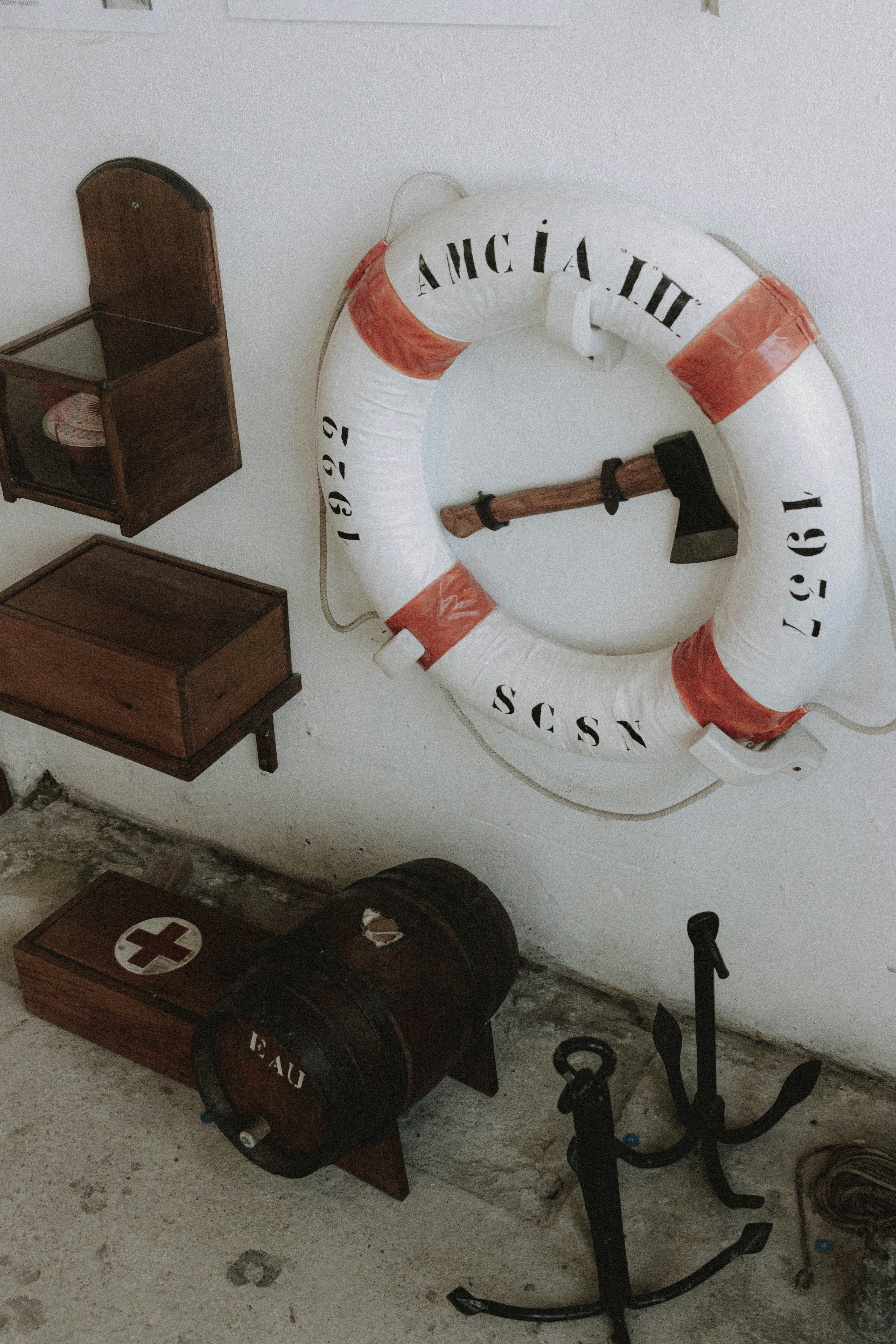 brown wooden box on white and red round table